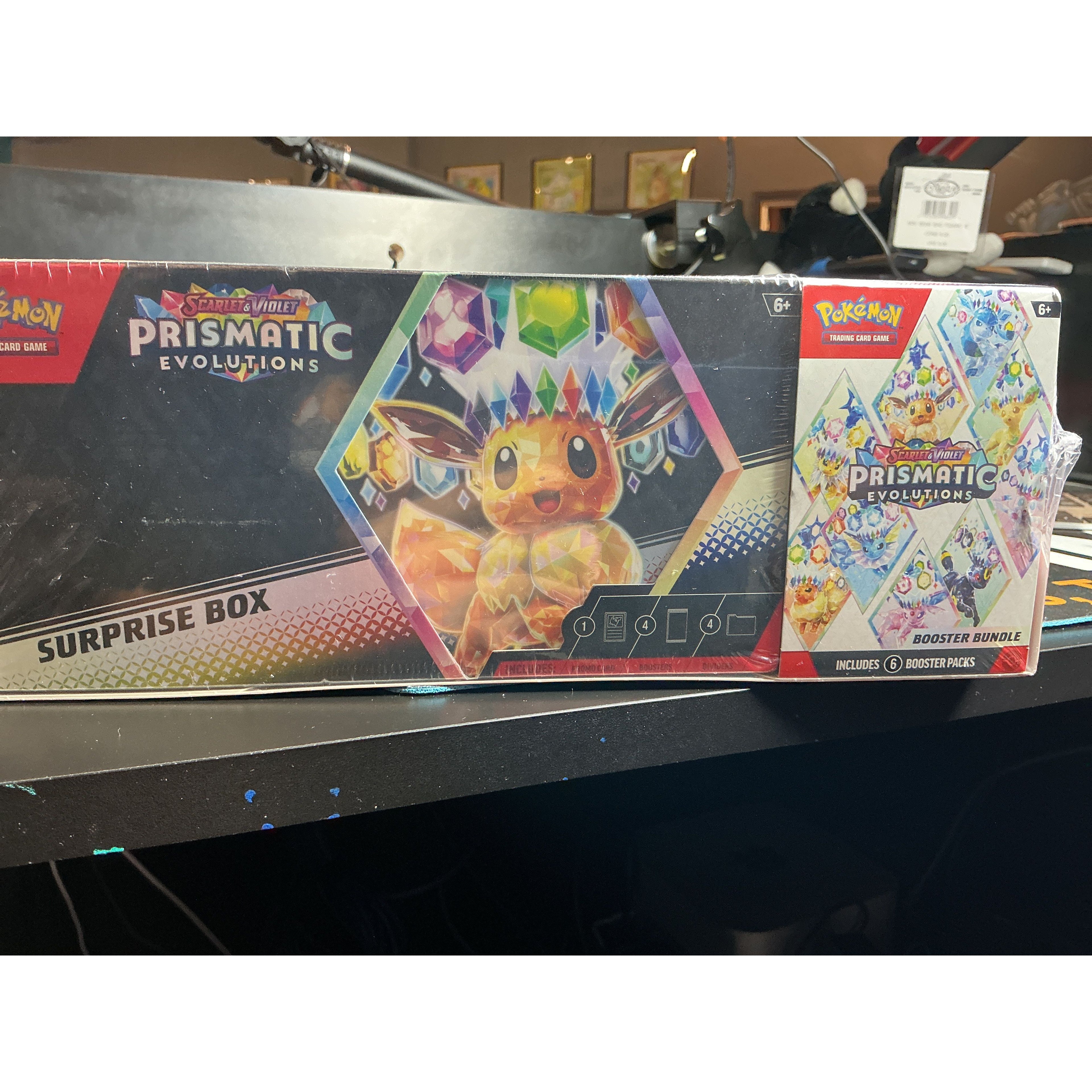 Prismatic Evolutions Surprise Box + Booster Bundle Pack