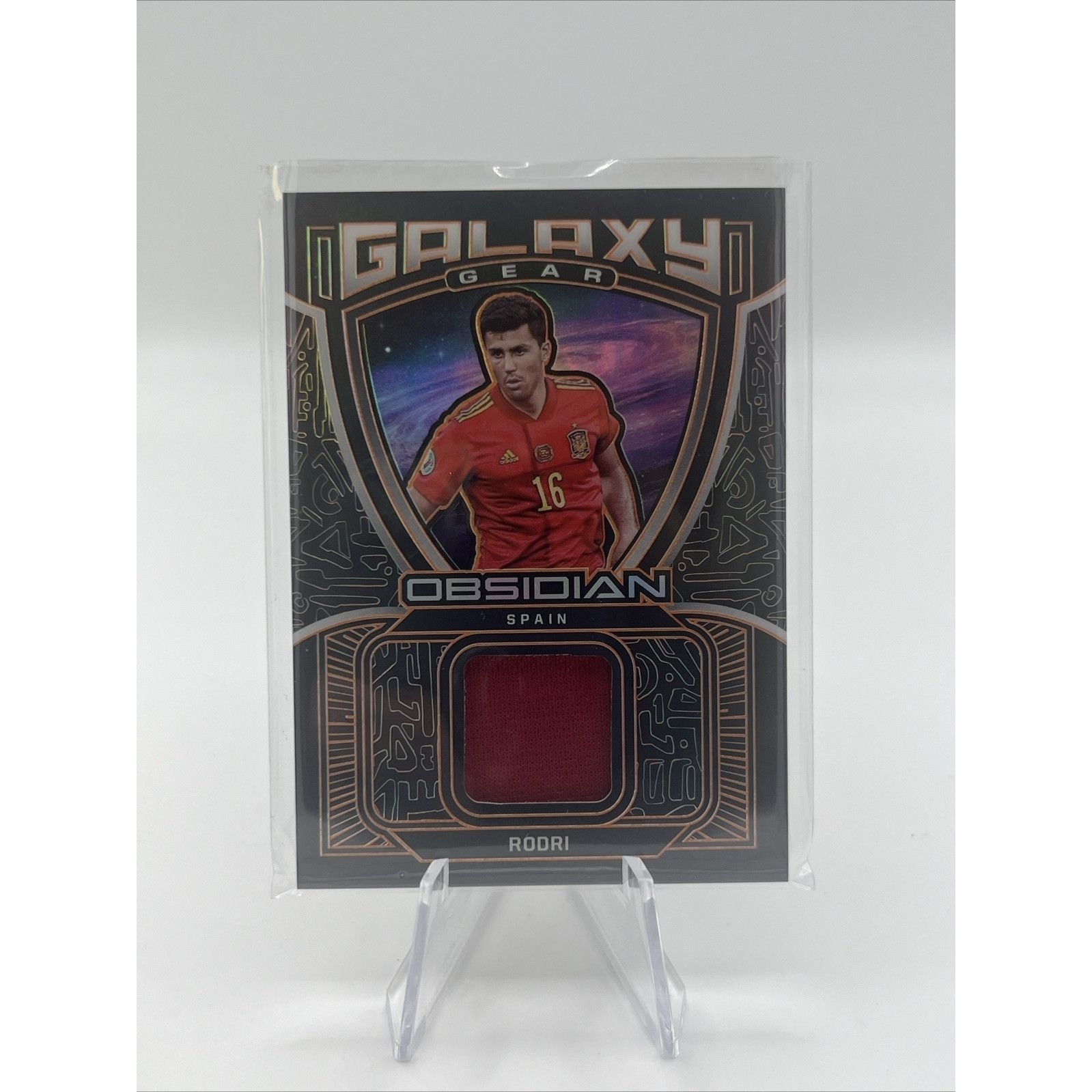 Panini 2021-22 Obsidian Galaxy Gear Rodri Spain Electric Etch Orange /50