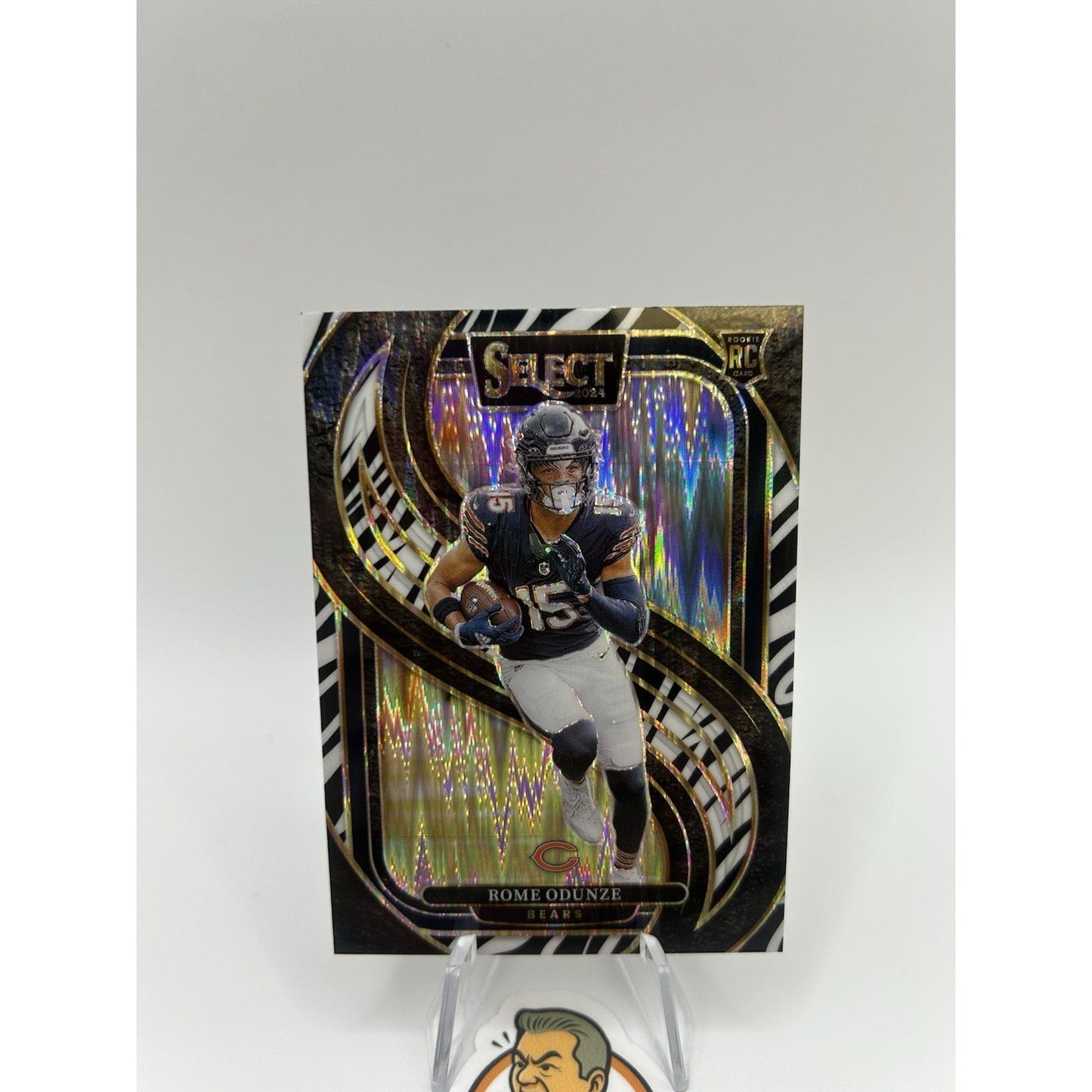 2024 Panini Select #136 Rome Odunze Zebra Prizm Shock Premier Level RC