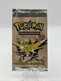 1999 Pokemon Fossil 1st Edition EMPTY Zapdos Pack Art Wrapper