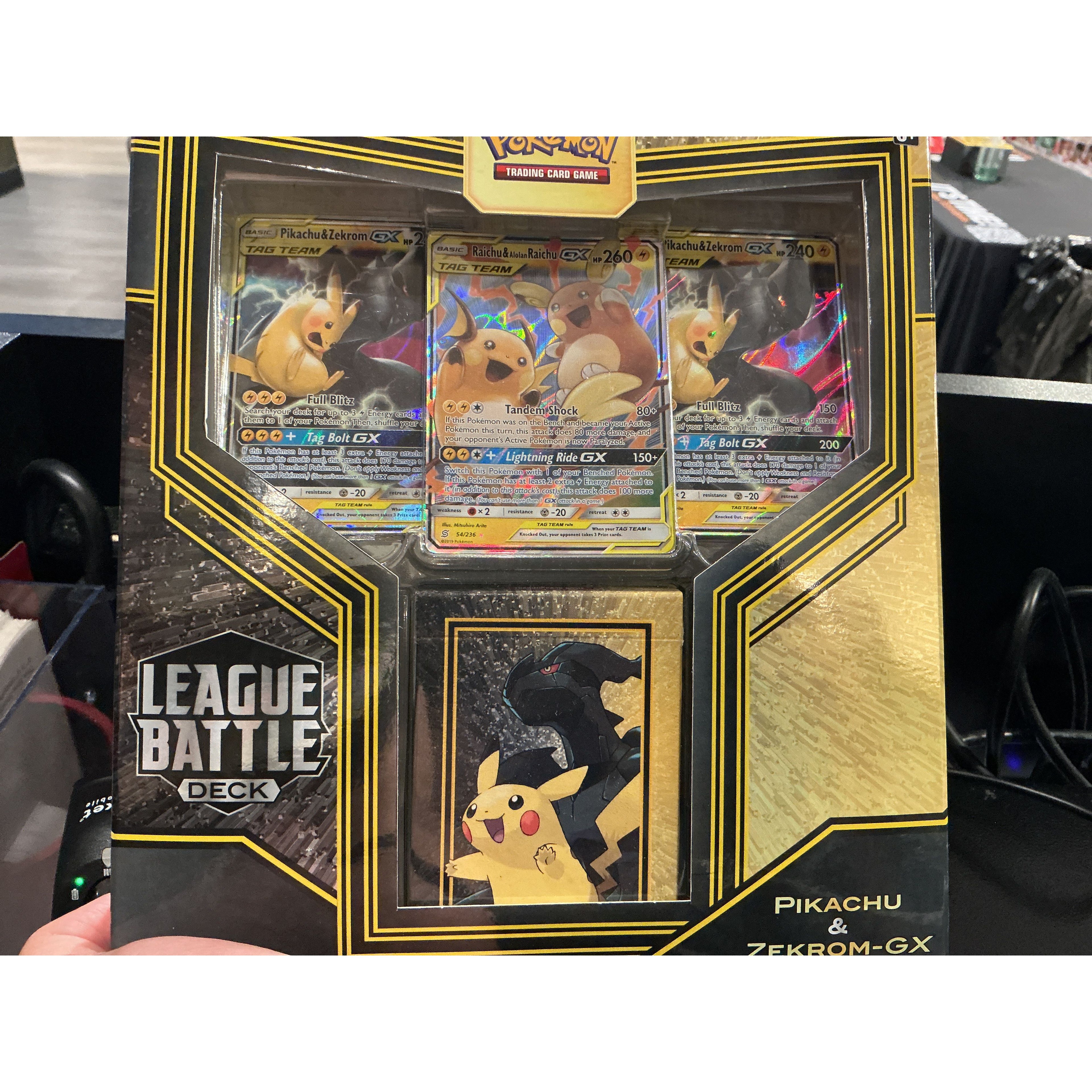 League battle Pikachu and Zekrom-GX team up